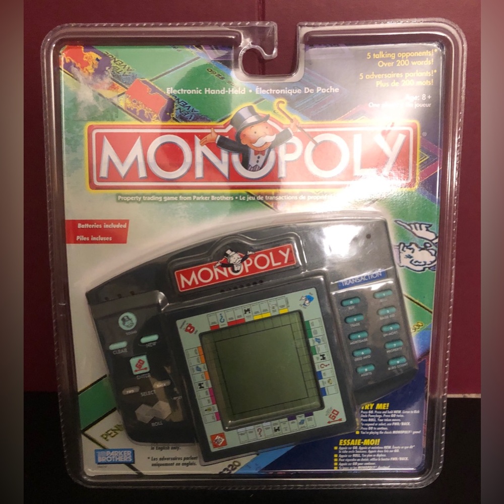 Monopoly 1997 Hasbro Electronic Handheld Game Parker Brothers